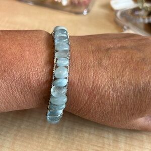 Aquamarine stones wrapped in 18k white gold overlay bangle